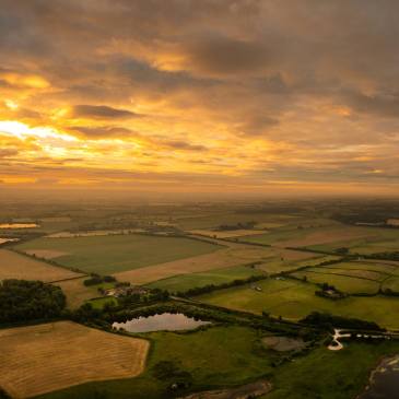 Thornborough henges from the north west at the summer solstice