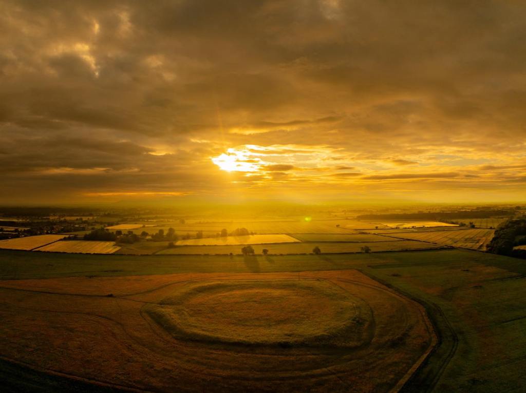 The Southern henge at thornborough under the midsummer sunrise